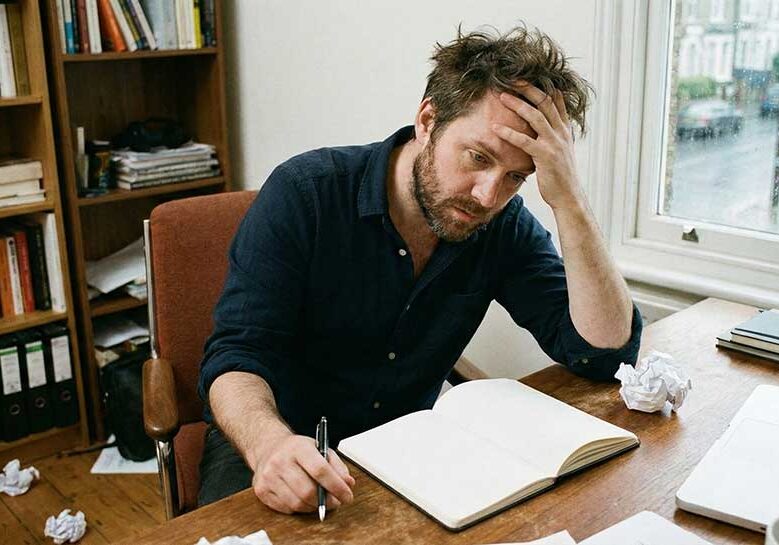 Frustrated writer attempting to write a book